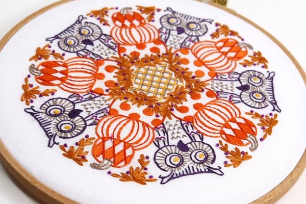 Mandala-inspired Halloween embroidery kit with pumpkins and owls.