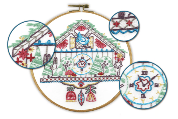 embroidered cuckoo clock in hoop and closeups