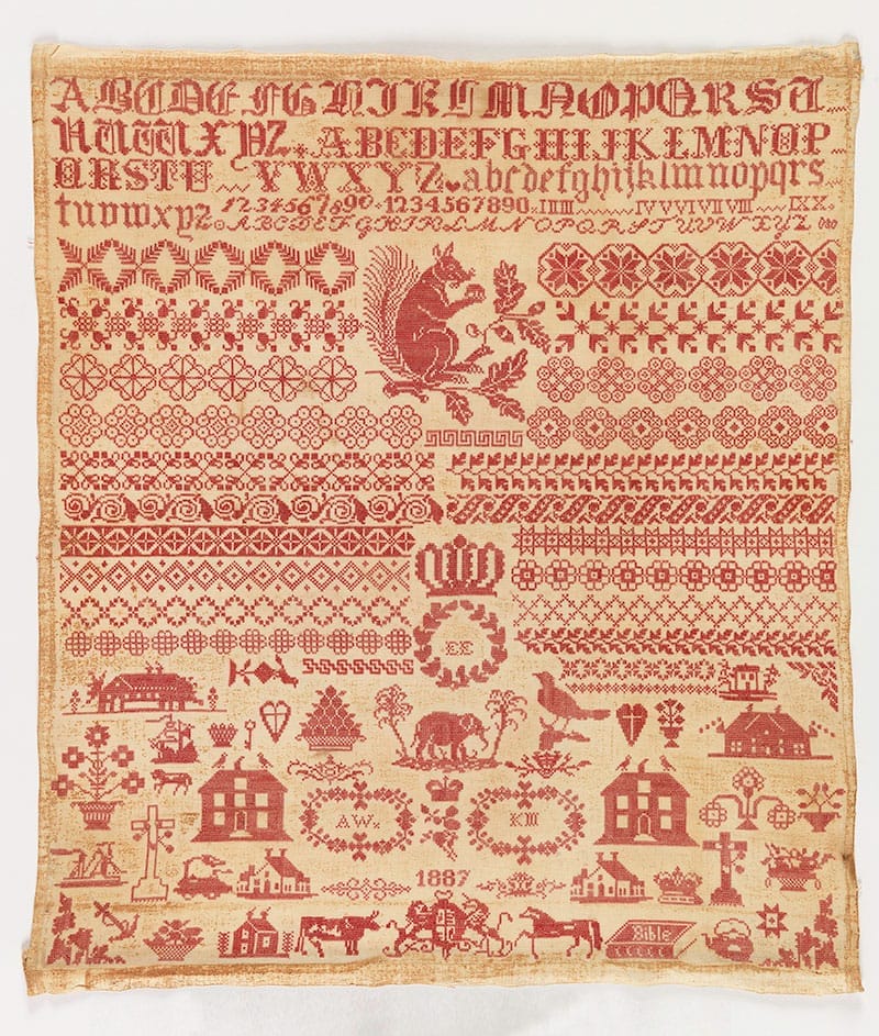 early example of embroidery band sampler