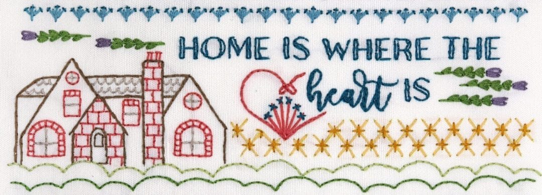 Embroidered detail from traditional embroidery stitch sampler with home themes