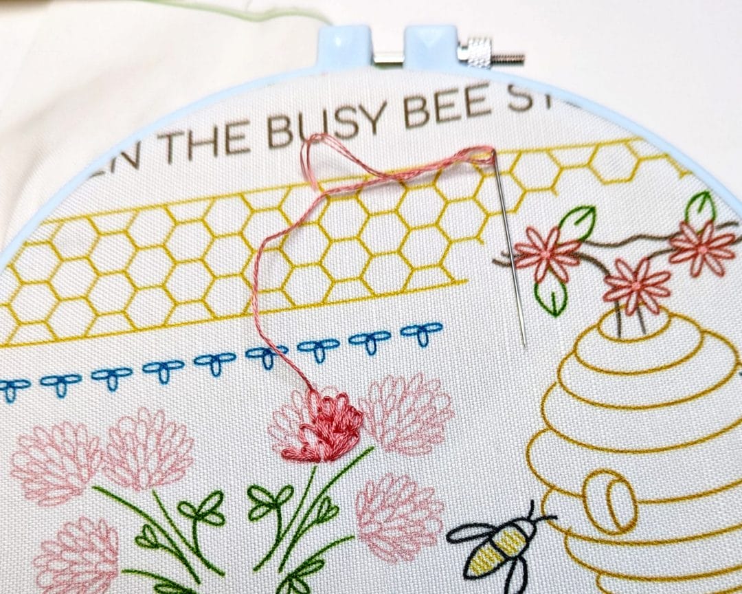 Embroidery in progress in hoop