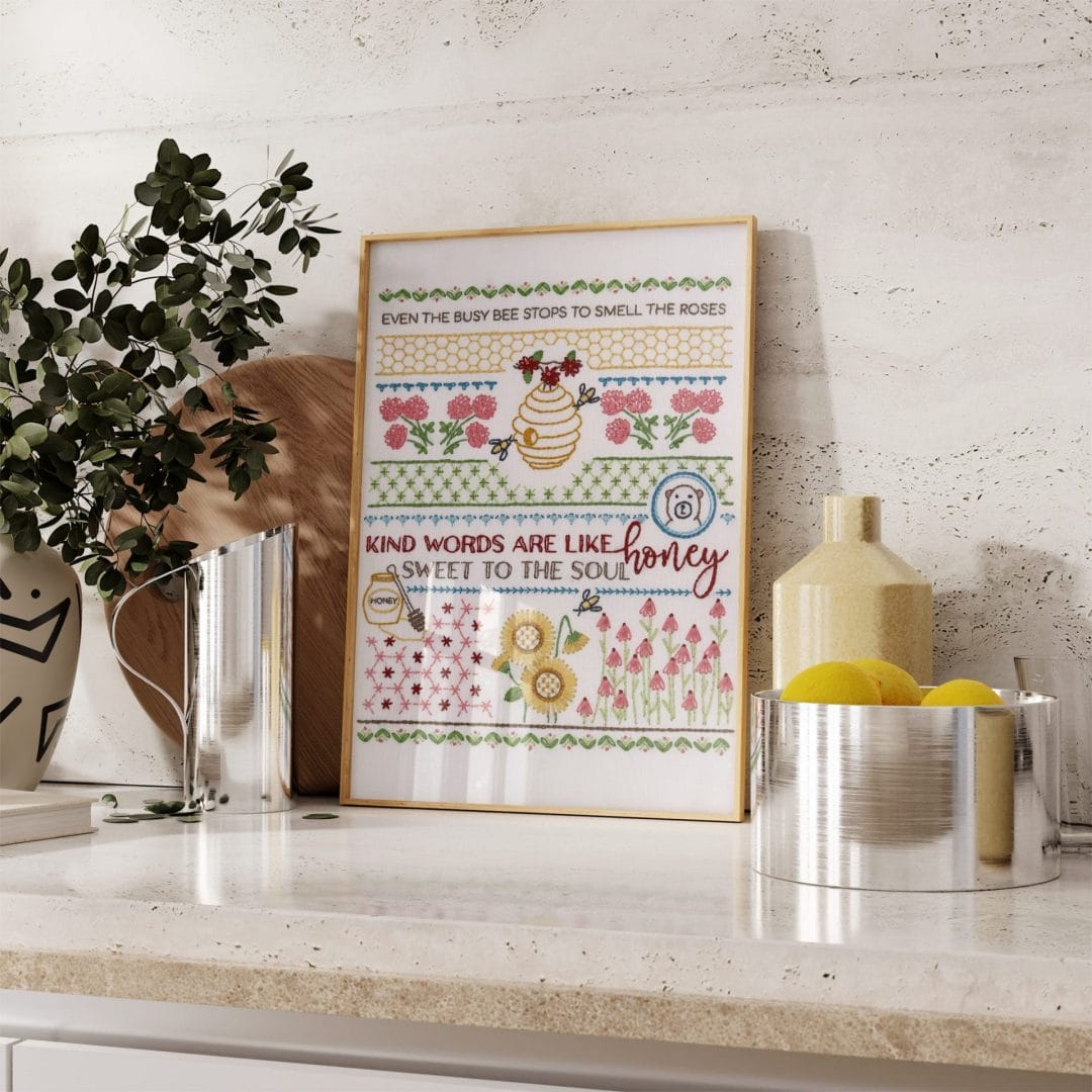 Traditional embroidery stitch sampler with honeybee themes