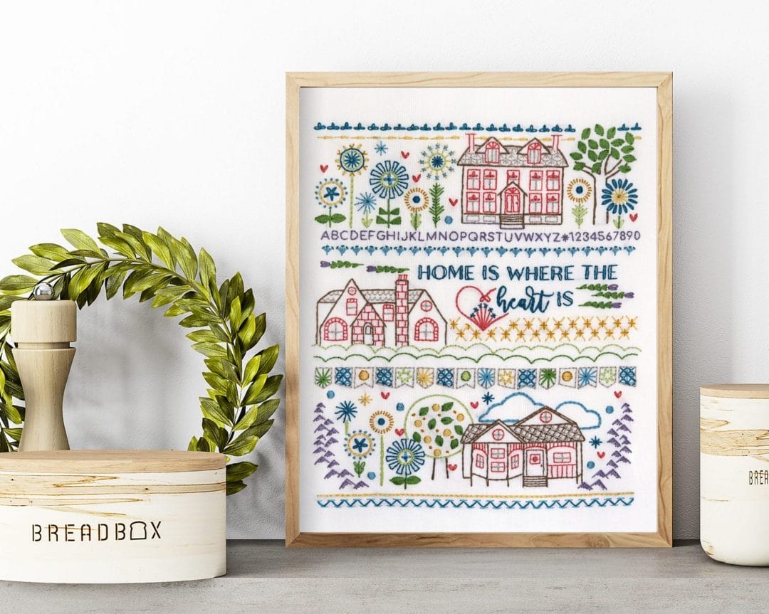 Traditional embroidery stitch sampler with home themes
