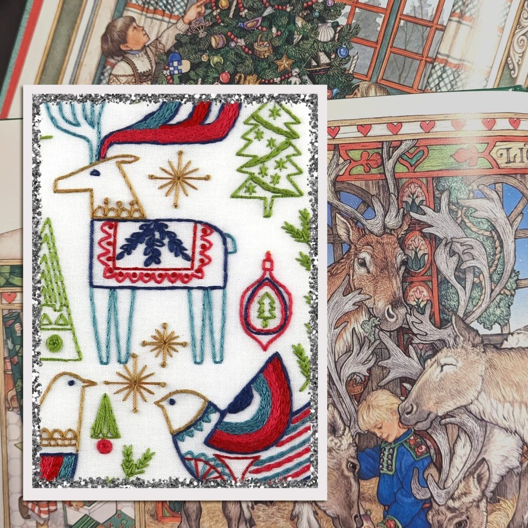 embroidered folk-art reindeers, birds and trees inspired by storybooks
