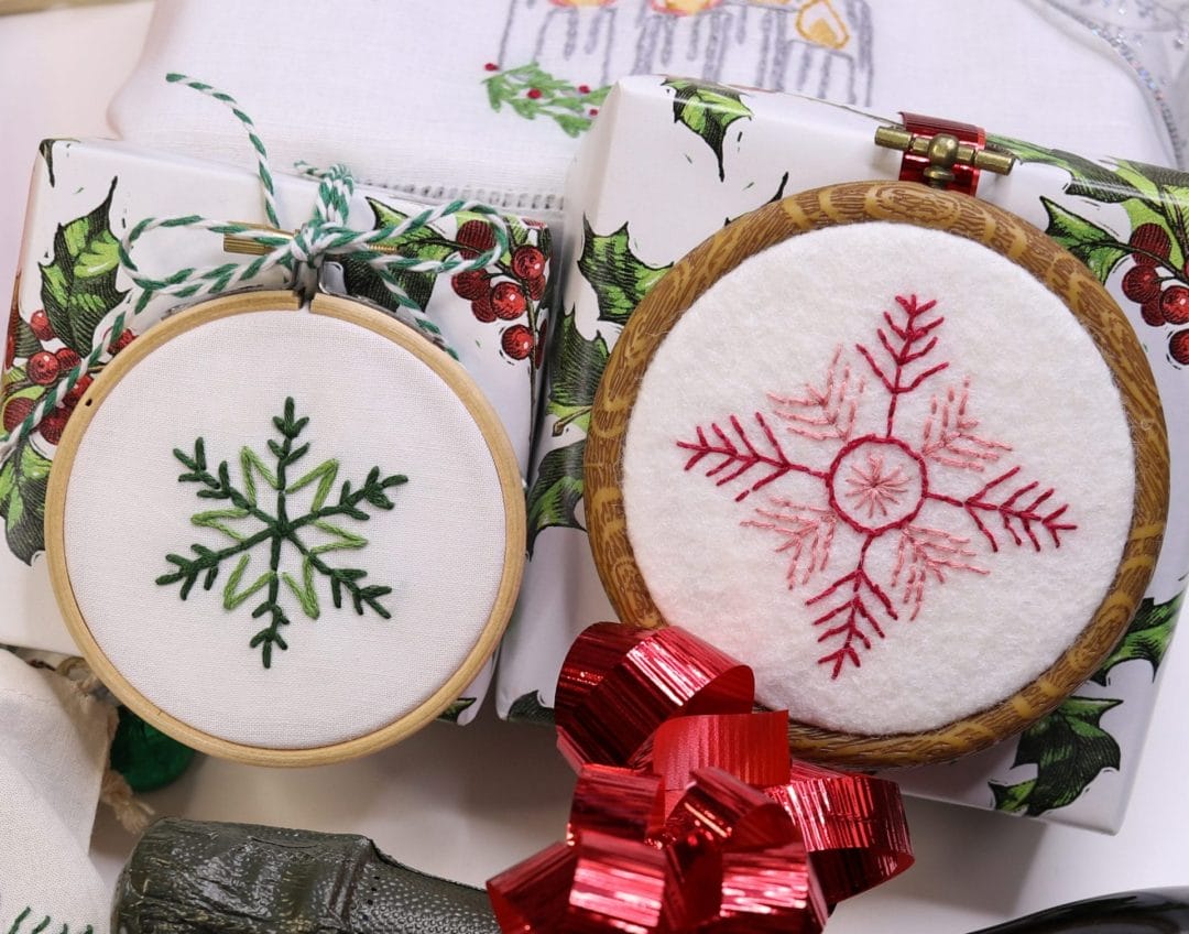 embroidered holiday ornaments used as gift toppers