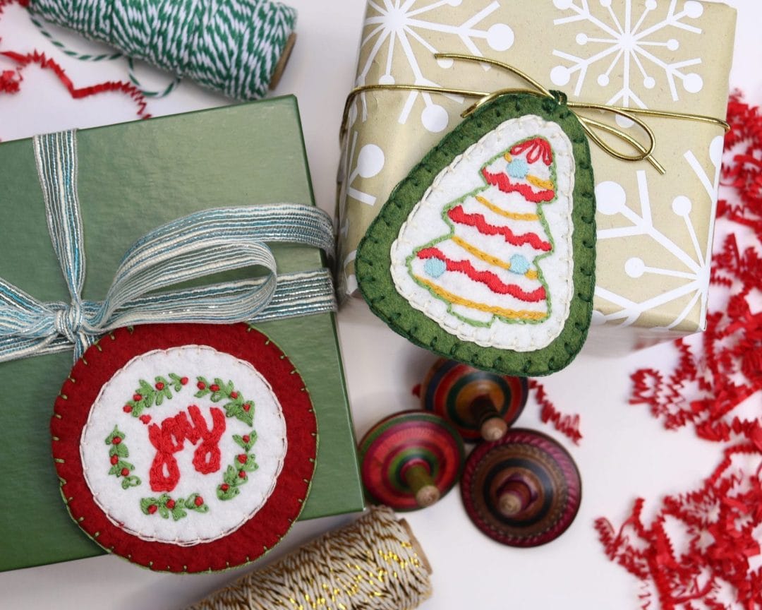 embroidered holiday ornaments used as gift tags