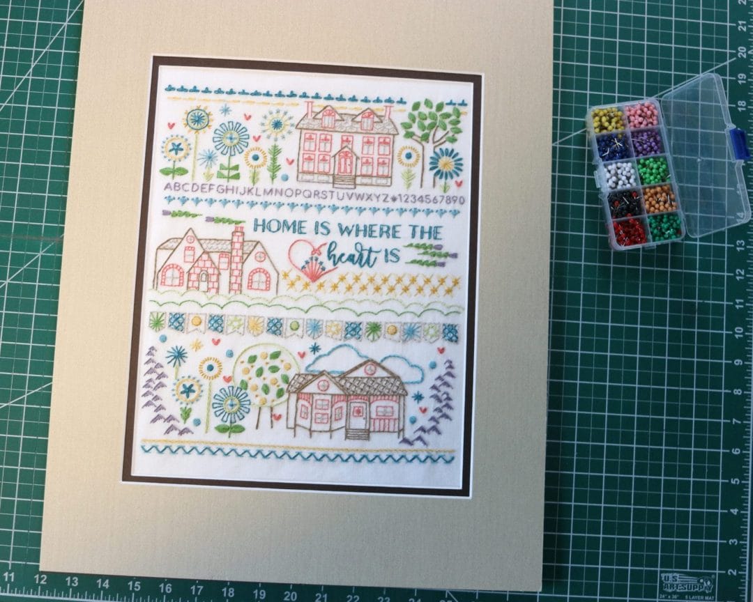 how to frame an embroidery stitch sampler yourself