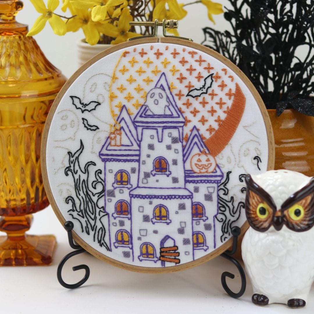 fall embroidery with spooky house on dispaly in home