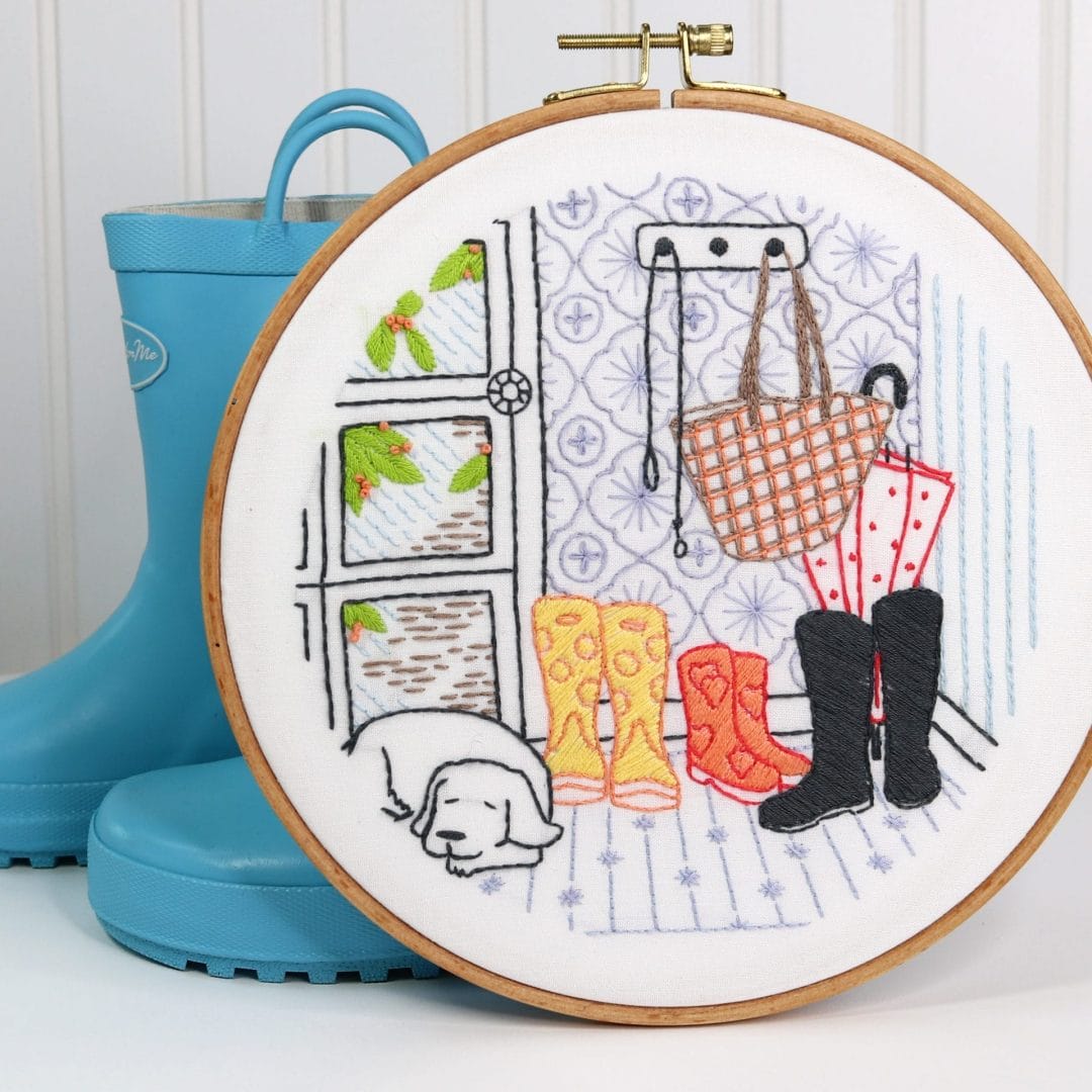Home-themed embroidery hoop project with mudroom scene