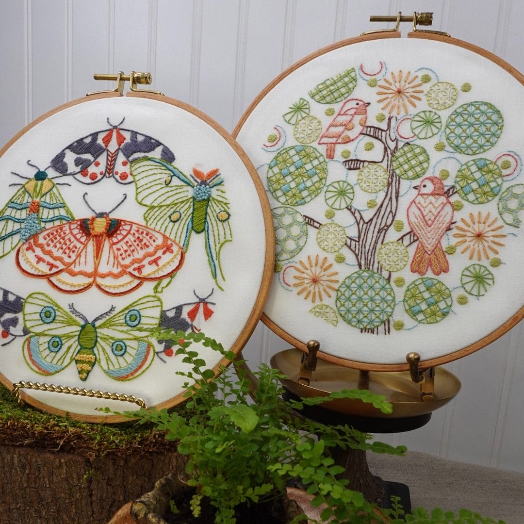 Moth and Tree of Life embroidery hoopart on display 
